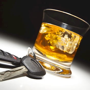 Car keys and a whisky glass