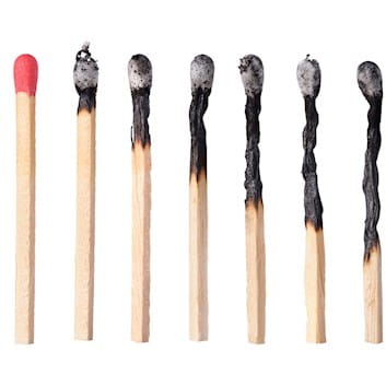 Row of burnt matchsticks