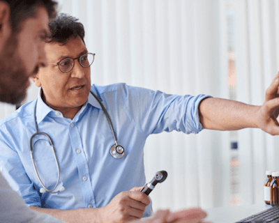 Doctor raising hand