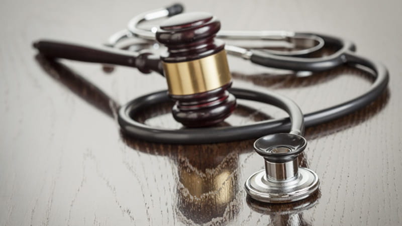 gavel and stethoscope-497243951.jpg